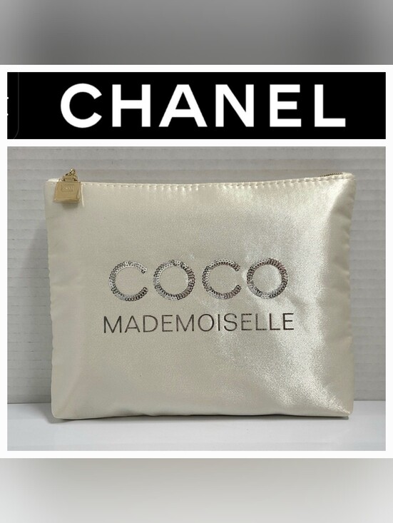 CHANEL Handbags - CHANEL Coco Mademoiselle Ivory Satin Makeup Pouch Silver Sequin Logo Gold Charm